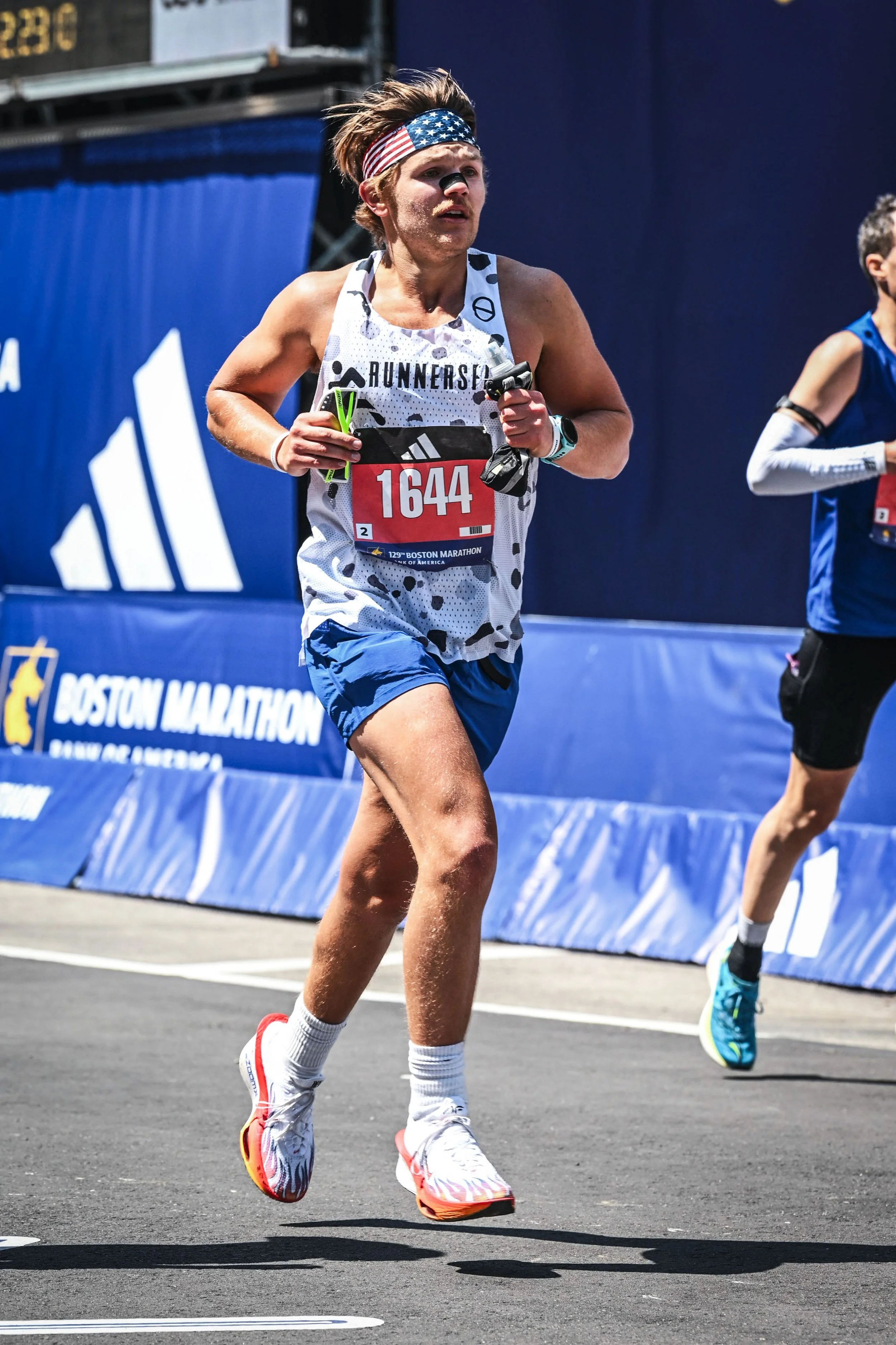 Ryan running in a marathon event at Boston.