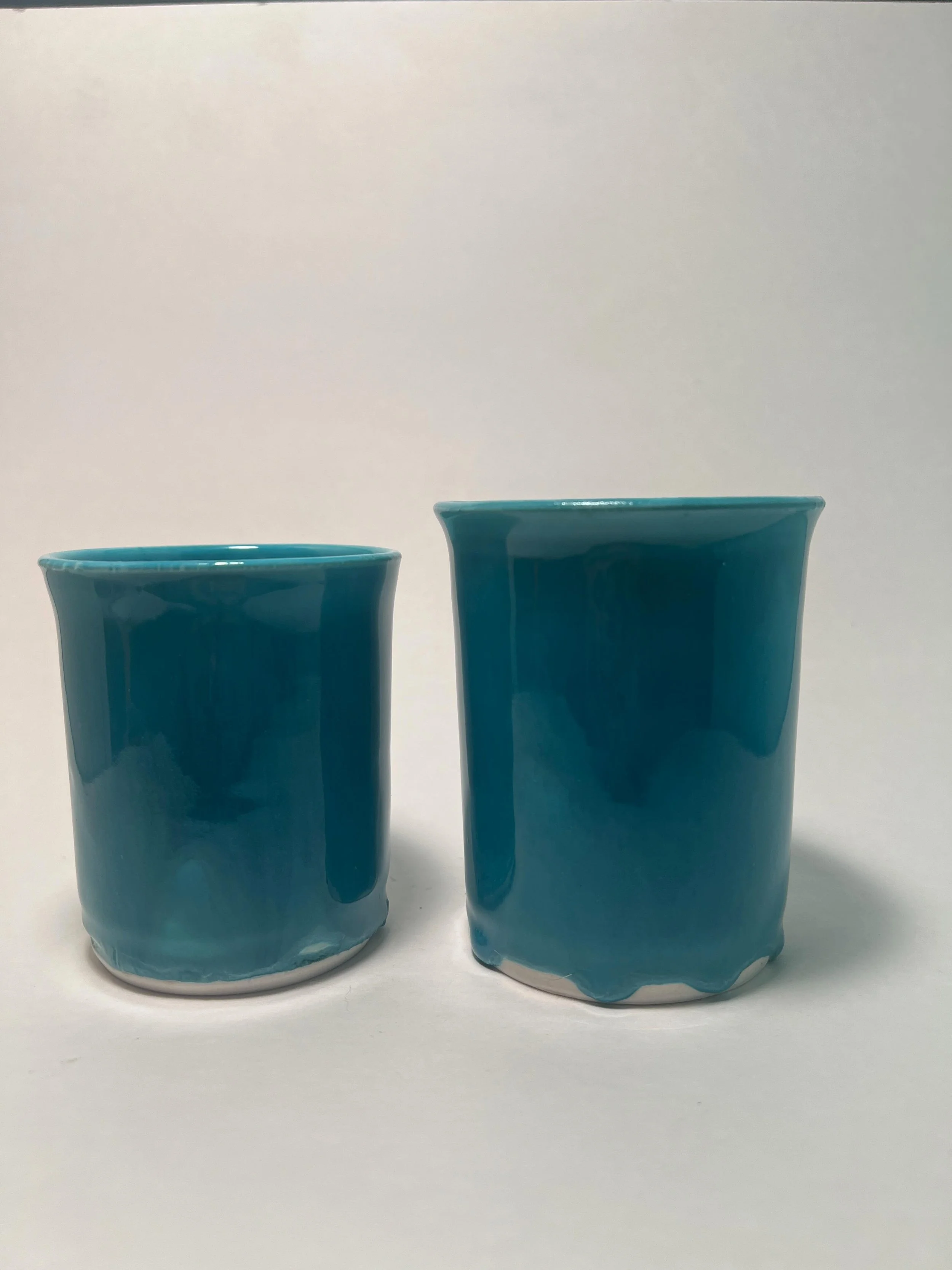 Translucent blue, largest in the batch 

https://www.etsy.com/listing/4558414952/blue-cup-set?ref=share_ios_native_control