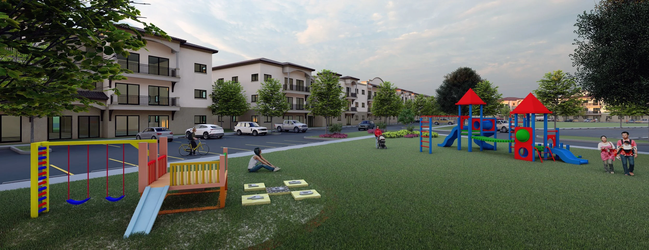 A playground in a residential complex with colorful play structures, swings, and hopscotch on the grass, surrounded by trees and parked cars, with apartment buildings in the background.