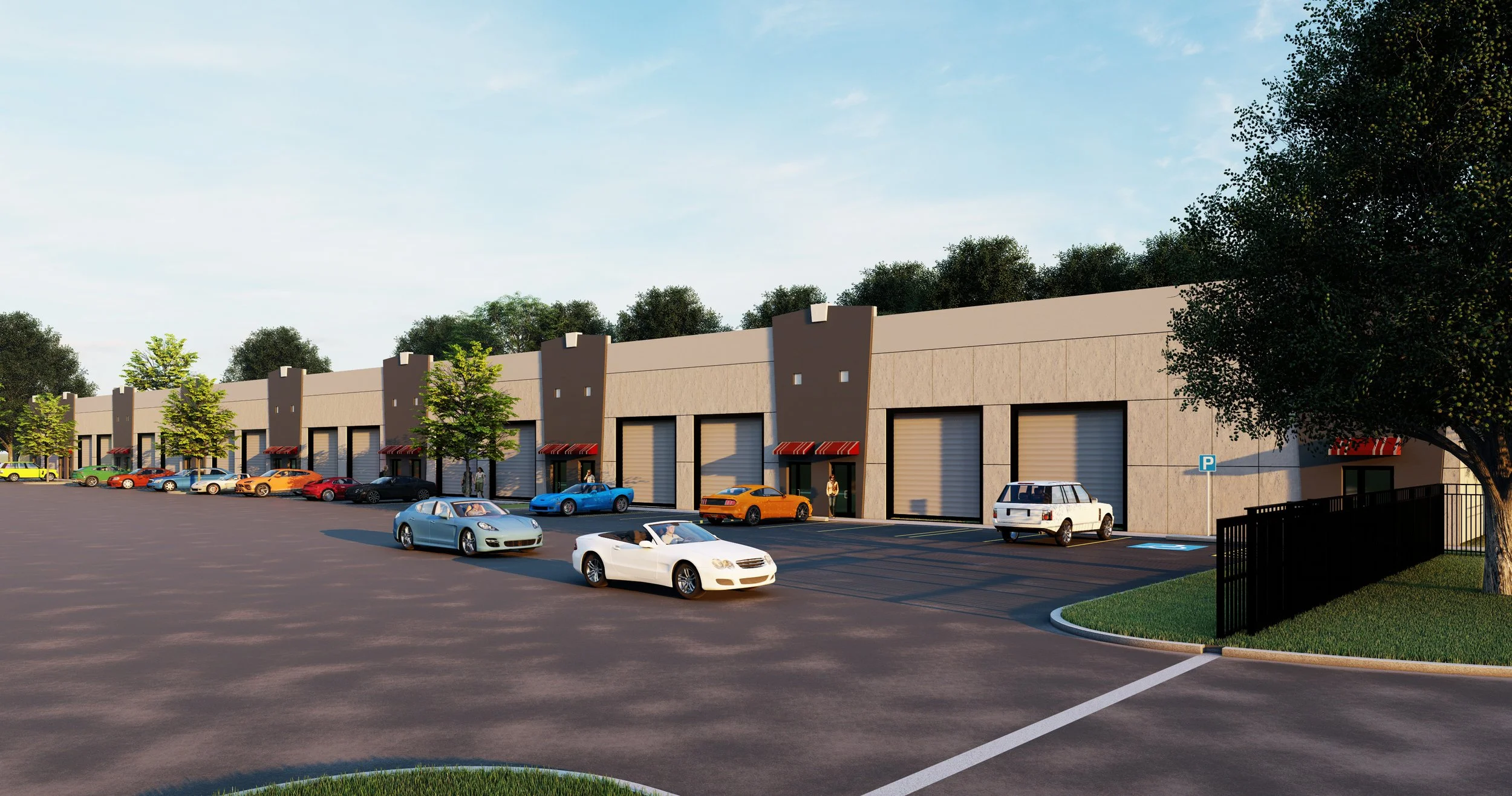 A modern commercial building with multiple storefronts, a parking lot with several cars, trees, and a blue sky.