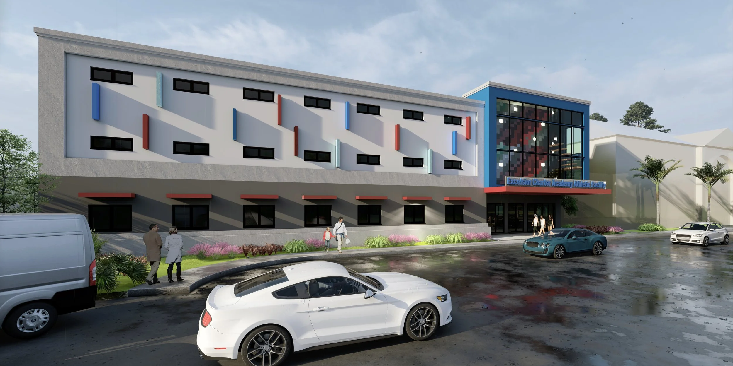 Rendering of a modern school building with a sign that reads 'Excelsior Charter Academy Athletic Facility,' featuring a blue and gray exterior, large glass entrance, parked cars, and people walking outside on a rainy day.