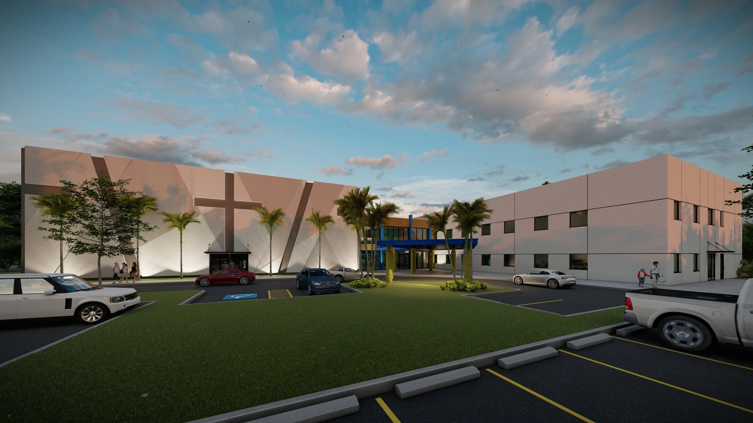 A modern building with a parking lot, palm trees, and a few cars, under a partly cloudy sky in the evening.