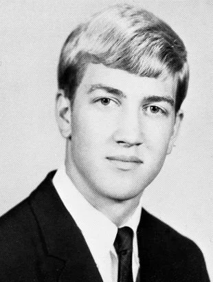 David Lynch Black and white yearbook-style portrait of a young man in a suit and tie with neatly combed light hair