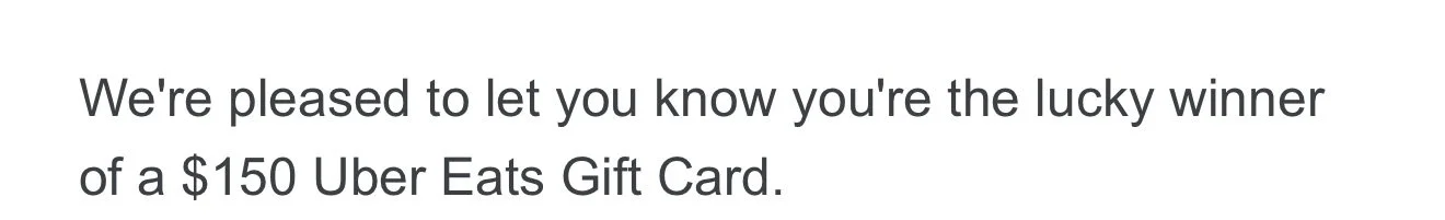 Text message stating the recipient has won a $150 Uber Eats gift card.