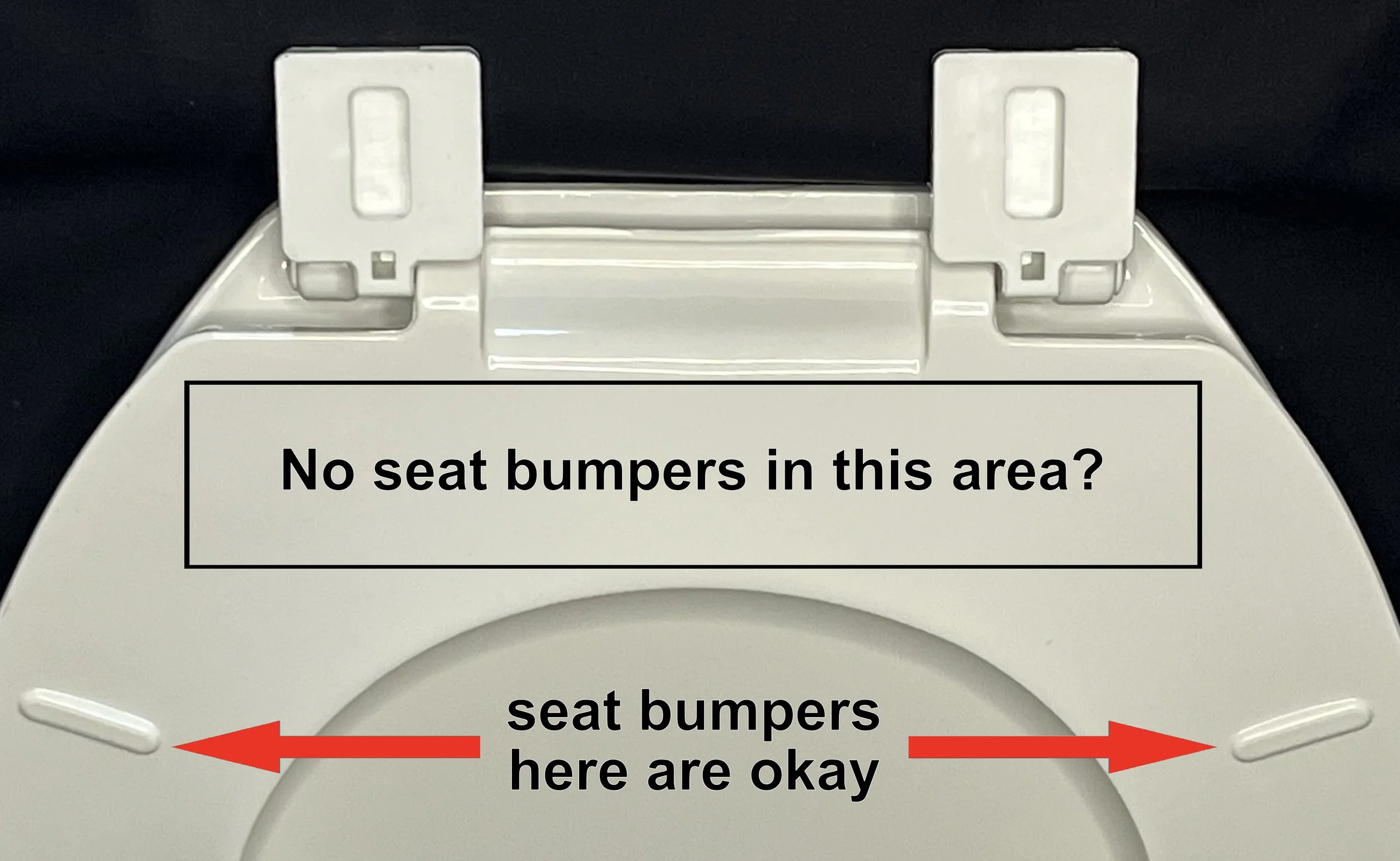 A close-up of the underneath of a toilet seat showing where the seat bumpers can and cannot be for the Bowl Tie to fit.