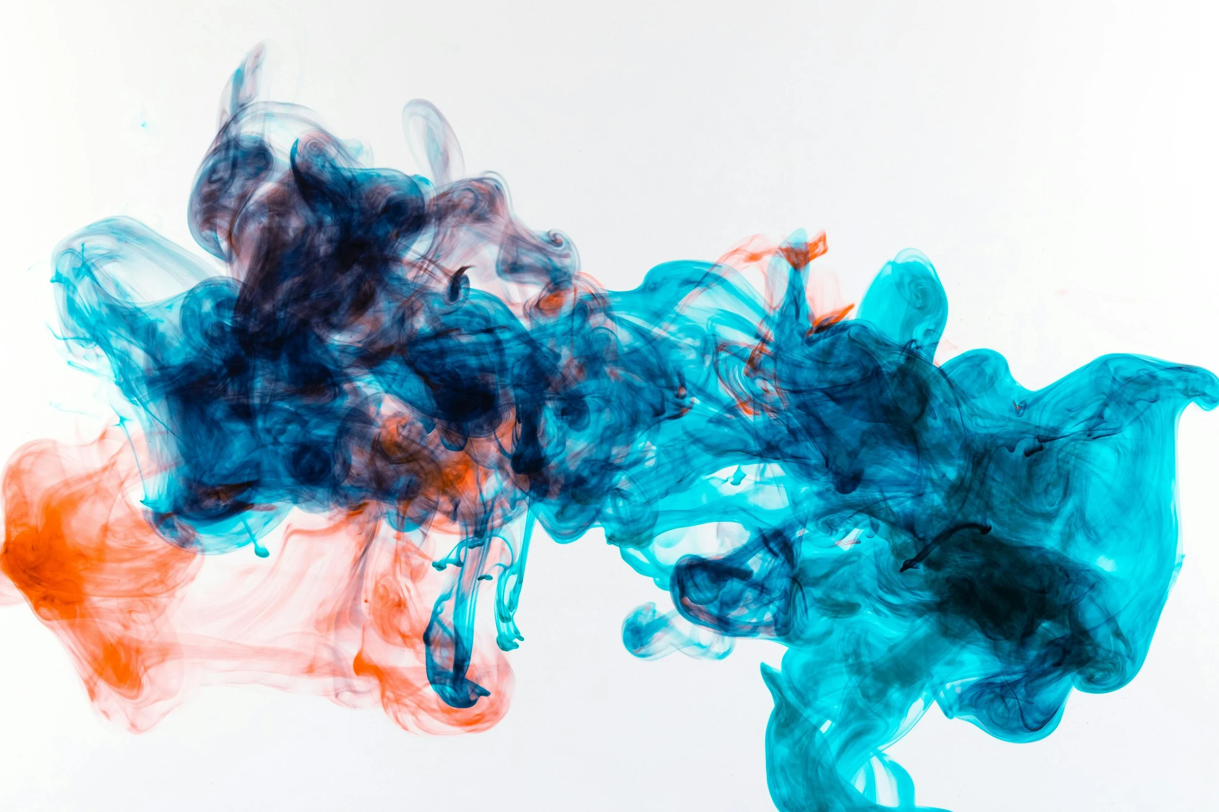 Different colors of of ink floating