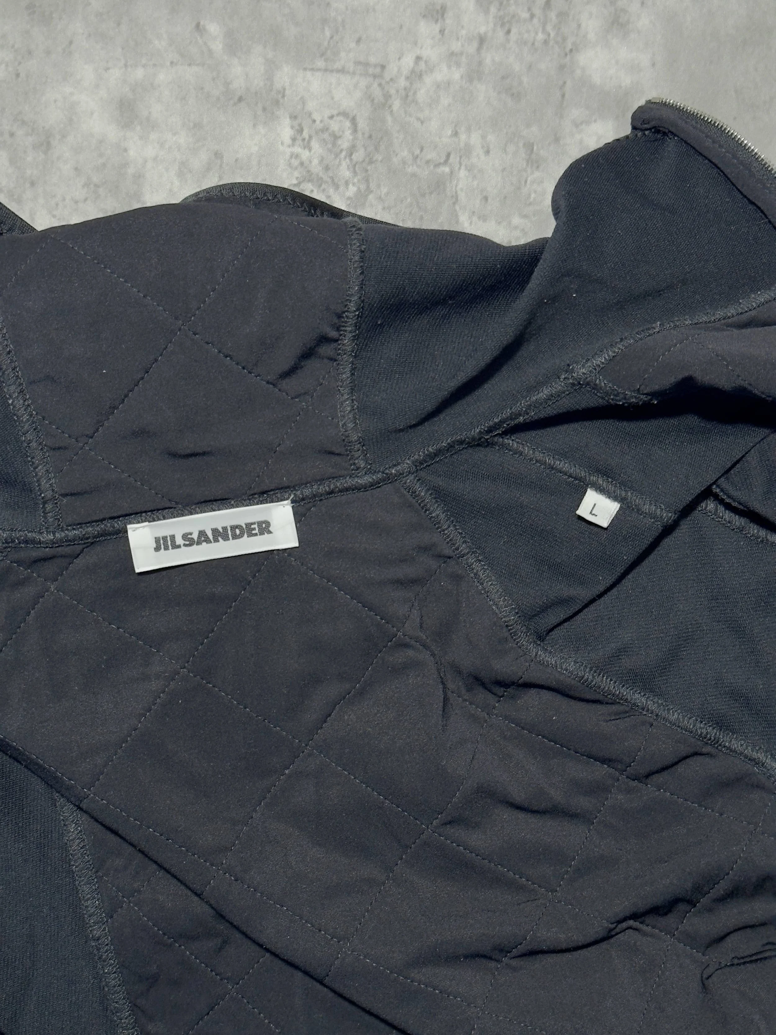 Vintage Jil Sander black sportswear set with technical stretch fabric and silver riri zippers
