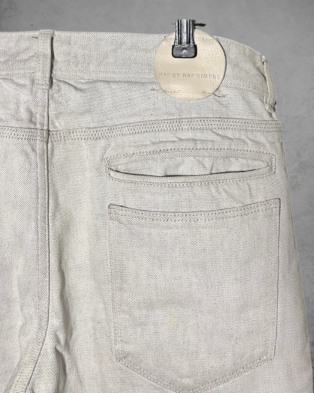archive white denim jeans by raf simons, painted cotton