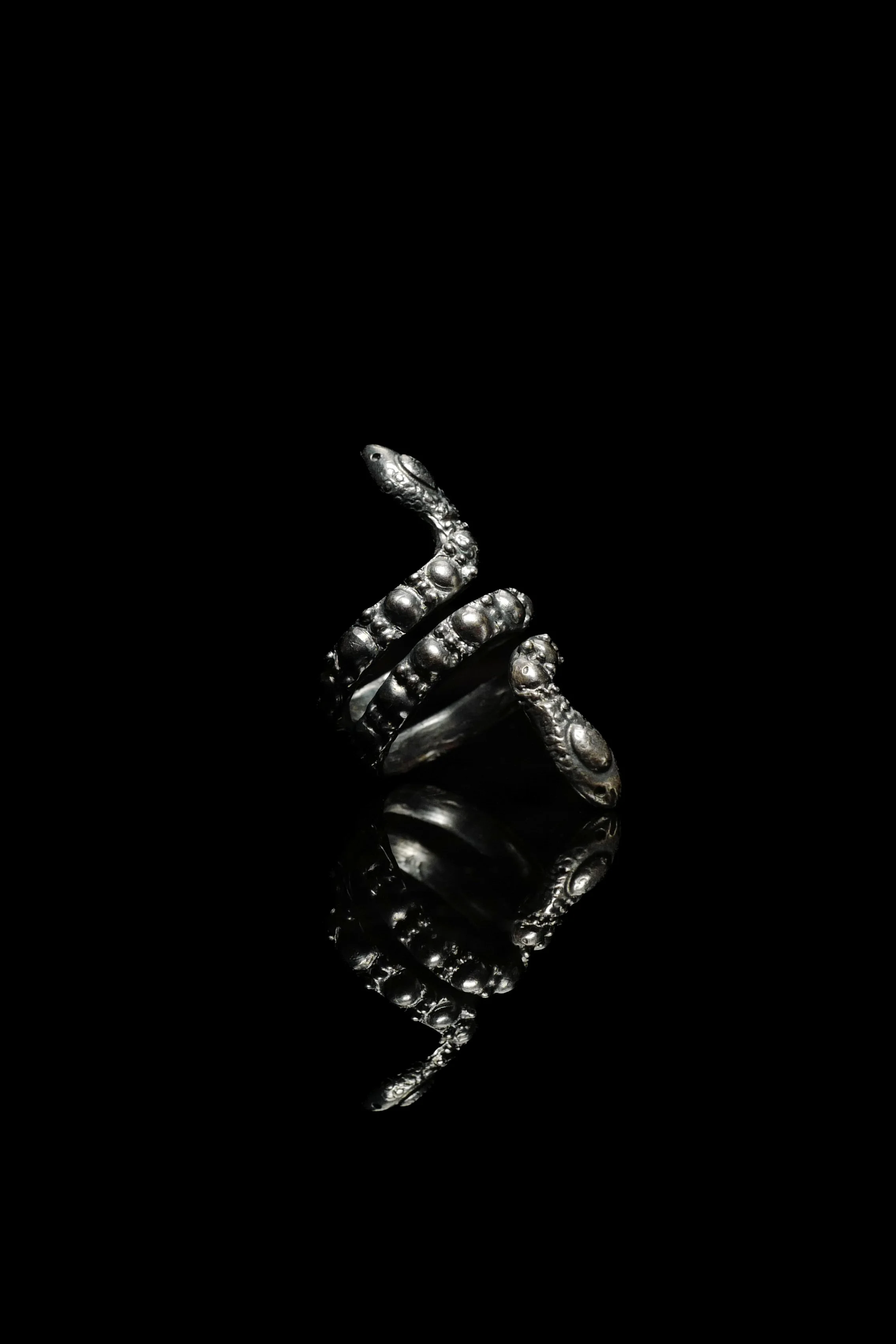 Copy of Oxidized silver double headed snake ring diagonal.jpg