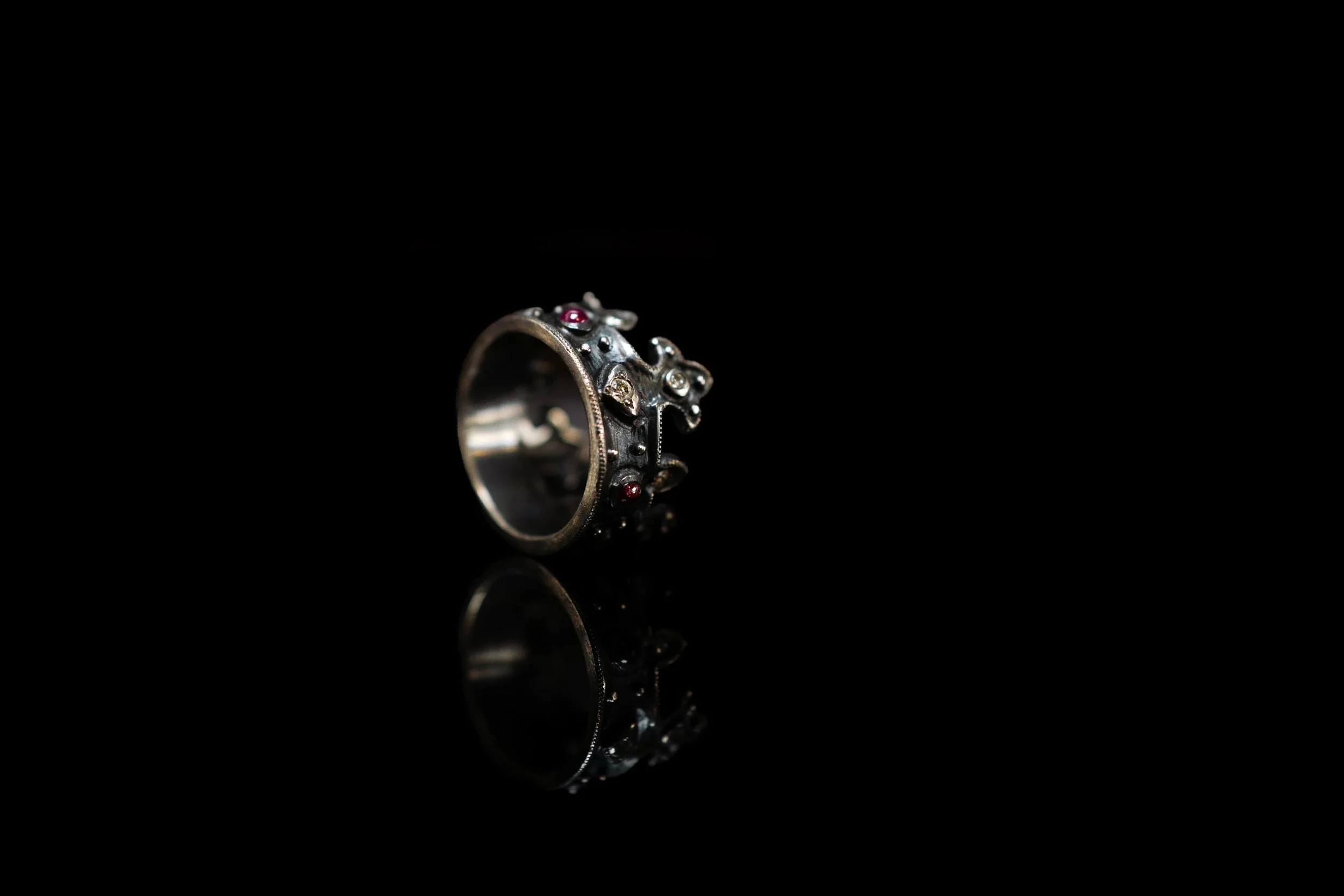 _ Ruby and Diamond Oxidized Sterling Silver Crown Ring on side.jpg