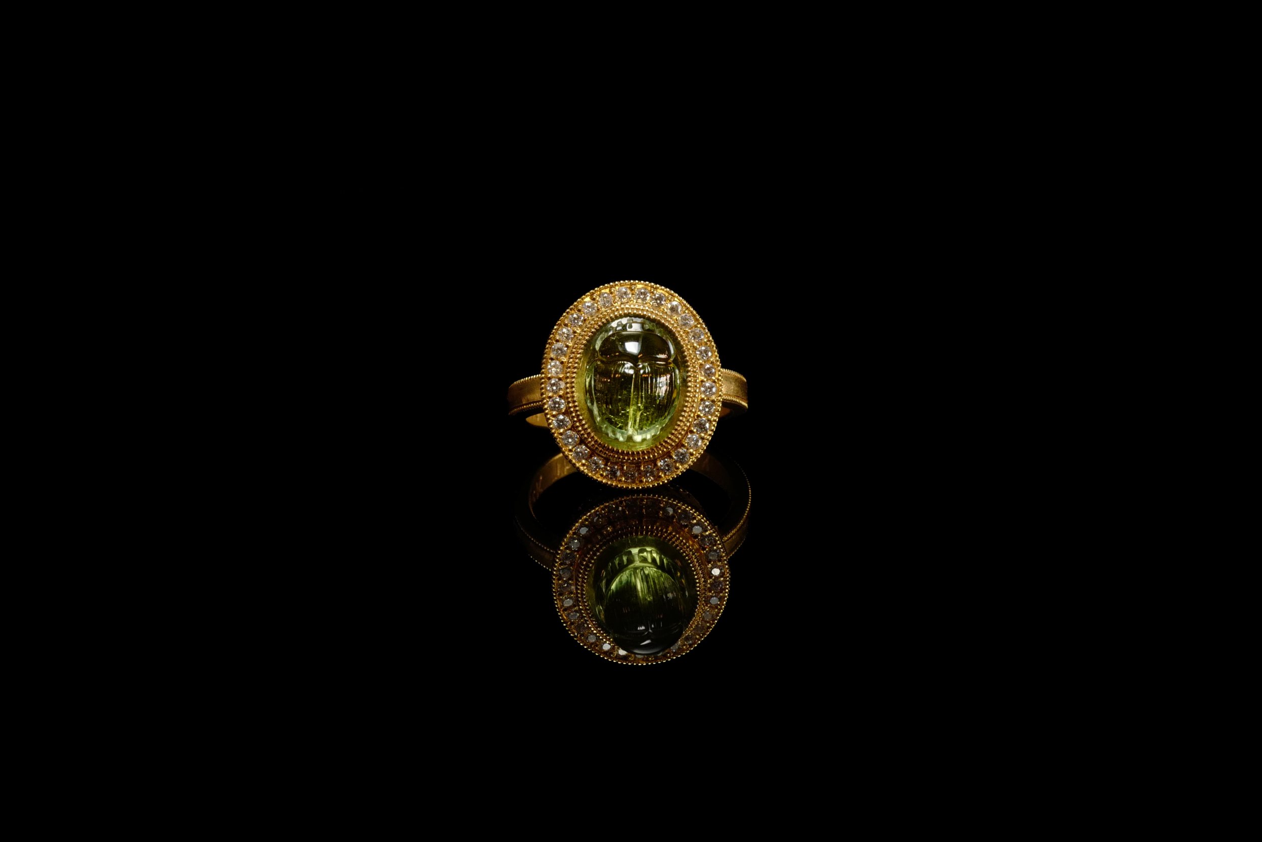 Pathei Mathos ring top down blacked out background.jpg
