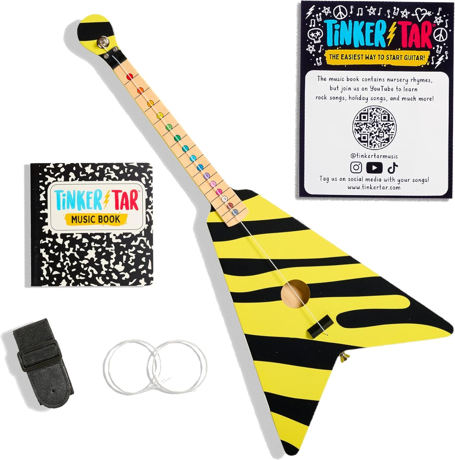 A children's toy guitar with a zebra print yellow and black design, a music book titled 'Tinkertar,' a wrist strap, and two clear bracelets, along with an informational card displaying social media and website details.