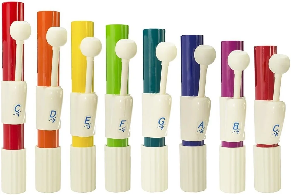 A set of colorful hand chimes labeled with musical notes and numbers, arranged from red to red in a row.