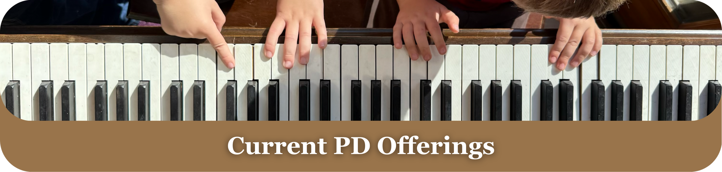 Top view of a child's hands playing piano keys, with text overlay reading 'Current PD Offerings'.