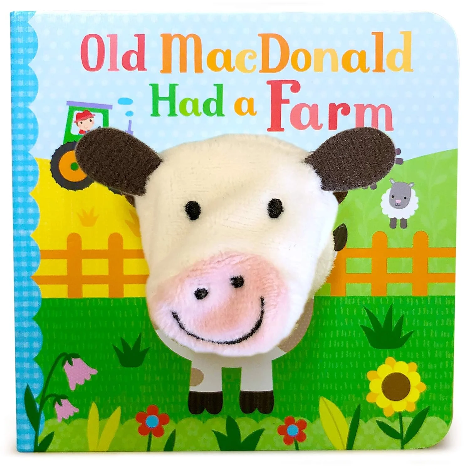 Old MacDonald Had a Farm. No artist named. There is a cow finger puppet through the center of the board book.