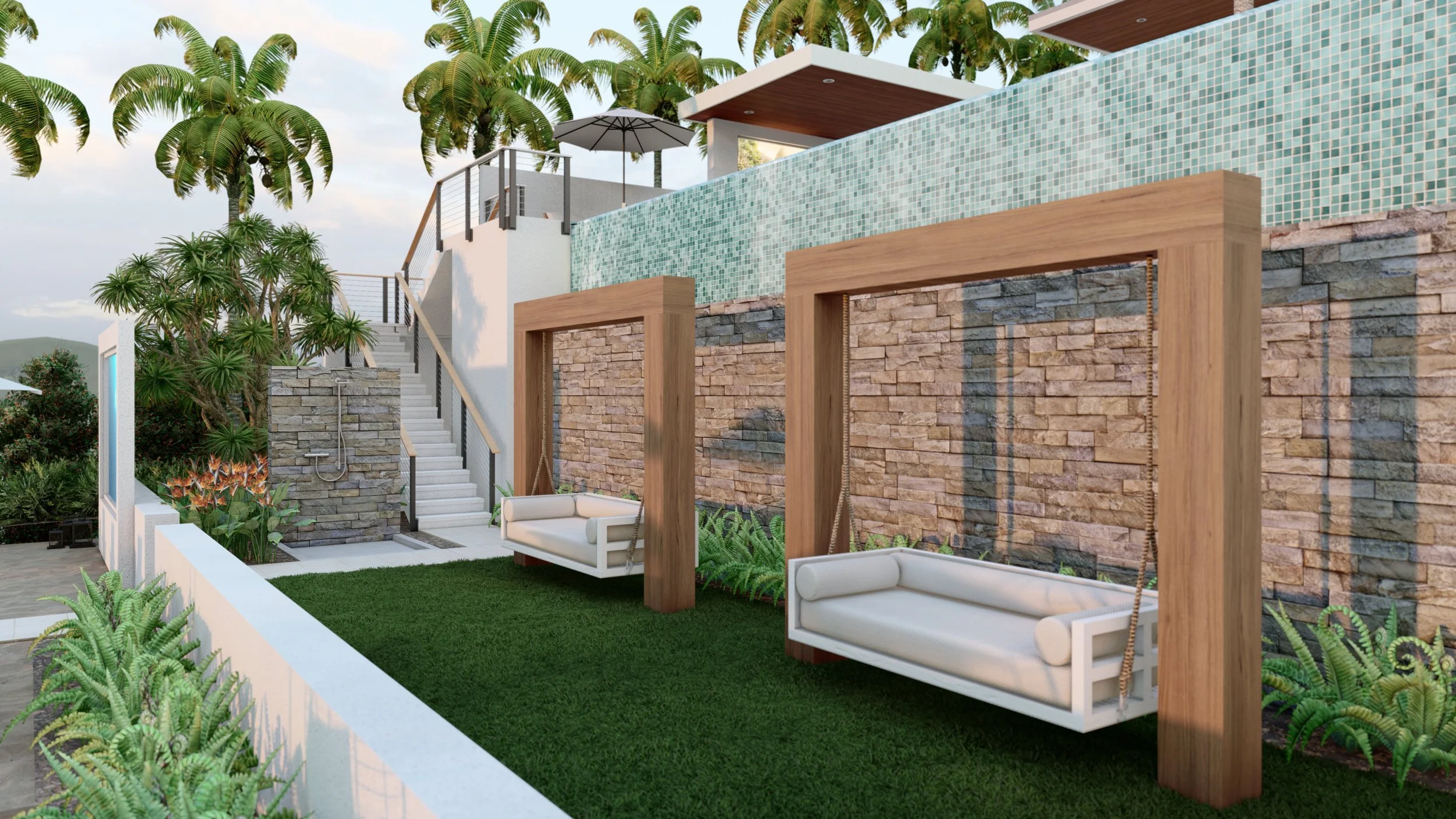 Two outdoor swing beds with white cushions hanging from wooden frames, set on a grassy area beside a stone wall with lush green plants, in a modern backyard with stairs, a pool, and palm trees in the background.