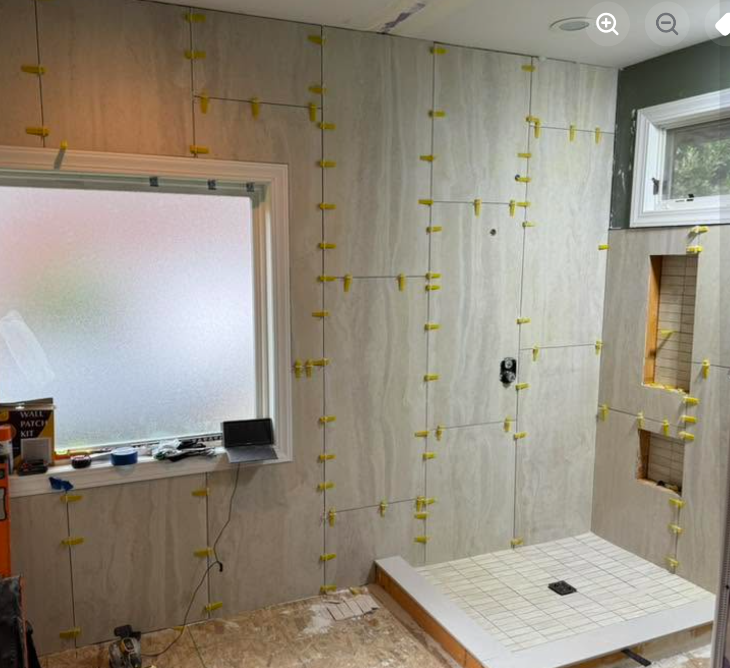 In-progress remodel with modern tile.