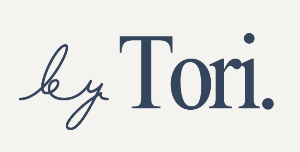 Typography logo reading 'by Tori' with 'by' in cursive and 'Tori' in bold font