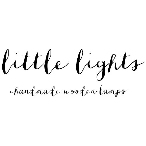 Logo for Little Lights, a company that makes handmade wooden lamps, written in black cursive font on a white background.