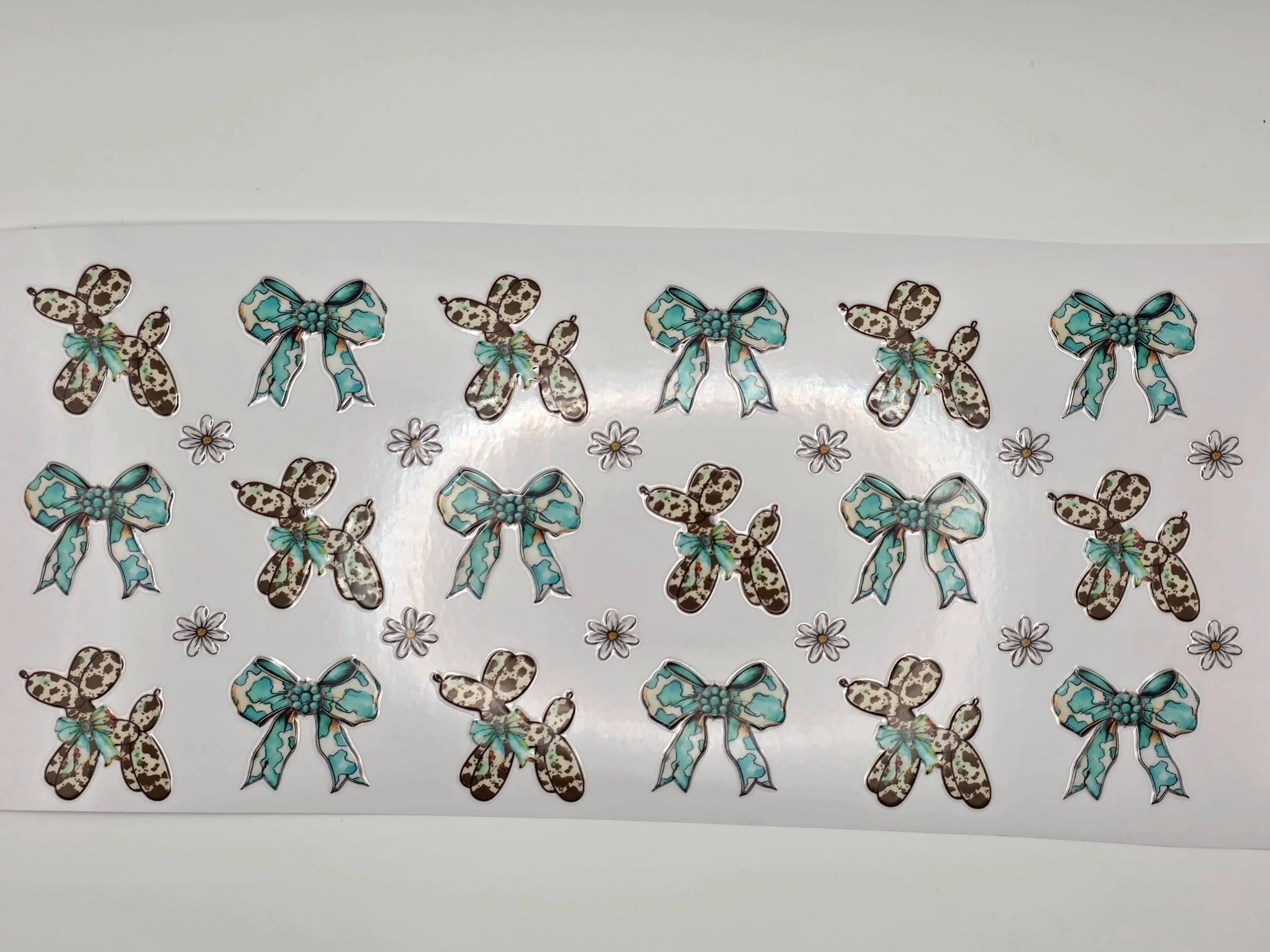 48- Cow Print Balloon Dogs