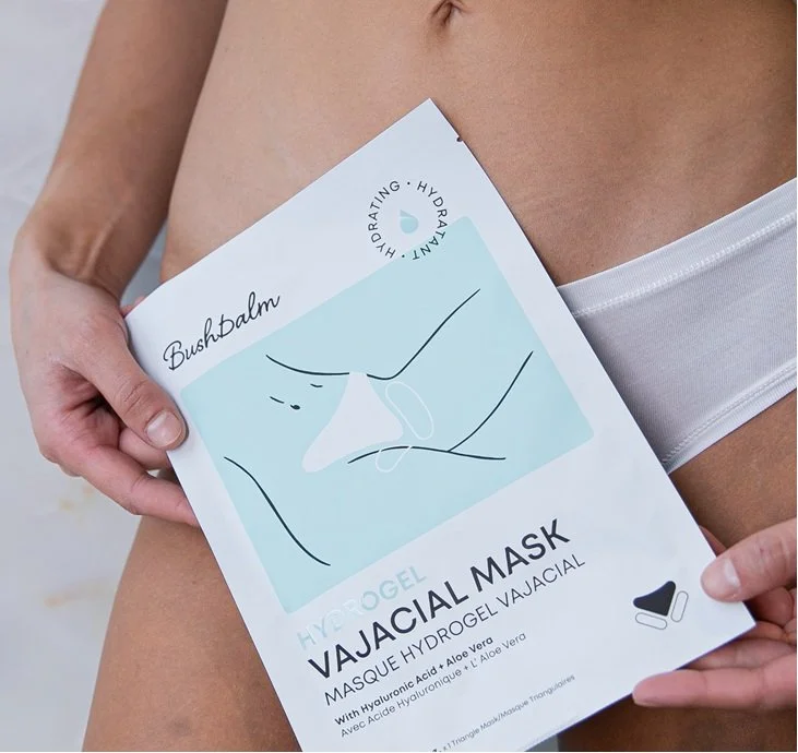 A close-up, spa-like scene showing the bikini area being treated with a smooth layer of Bushbalm’s soothing vajacial mask