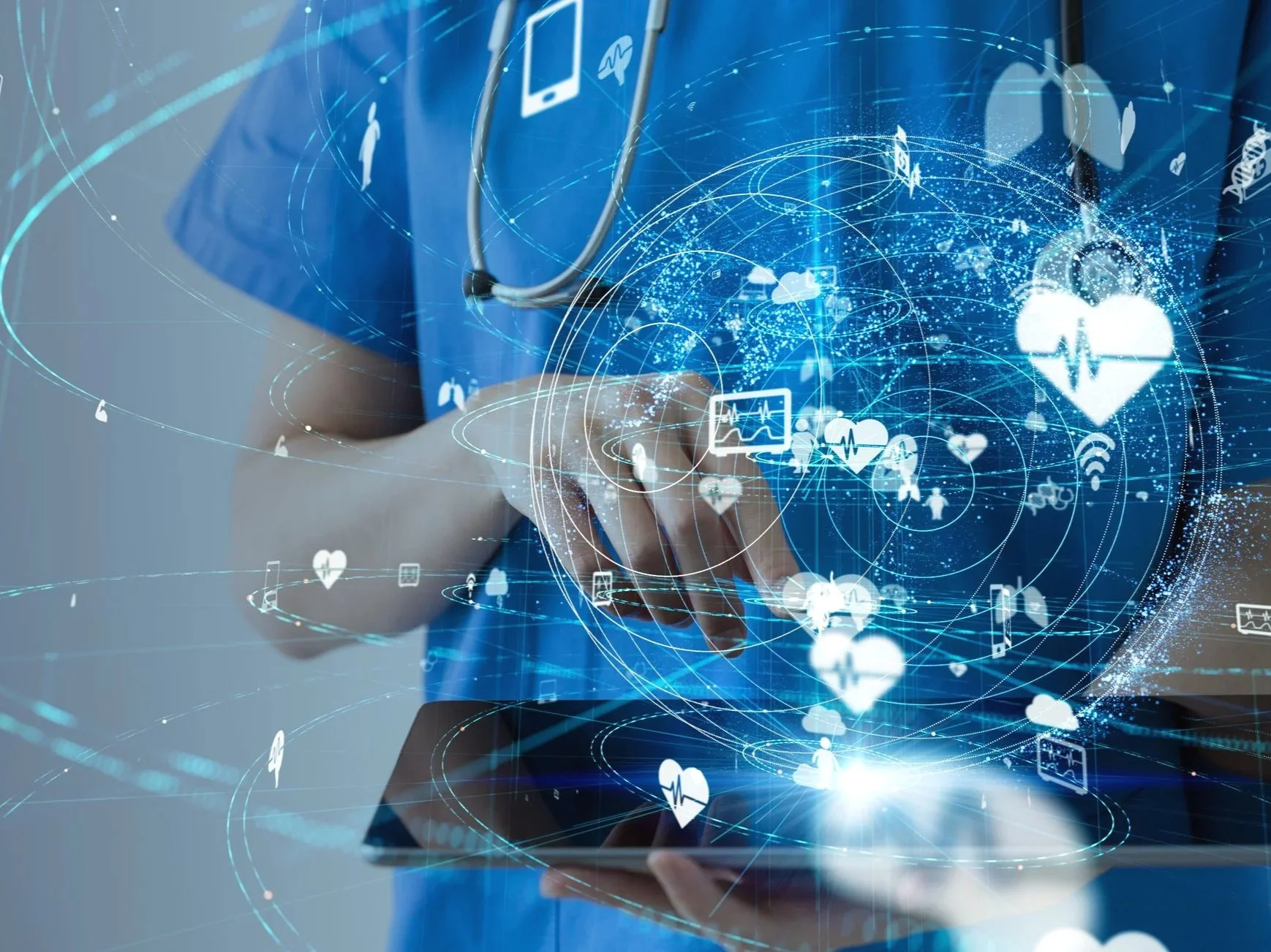 Physician or nurse practitioner in blue scrubs with a stethoscope, using a tablet, surrounded by digital icons representing health, medicine and clinical directorship.