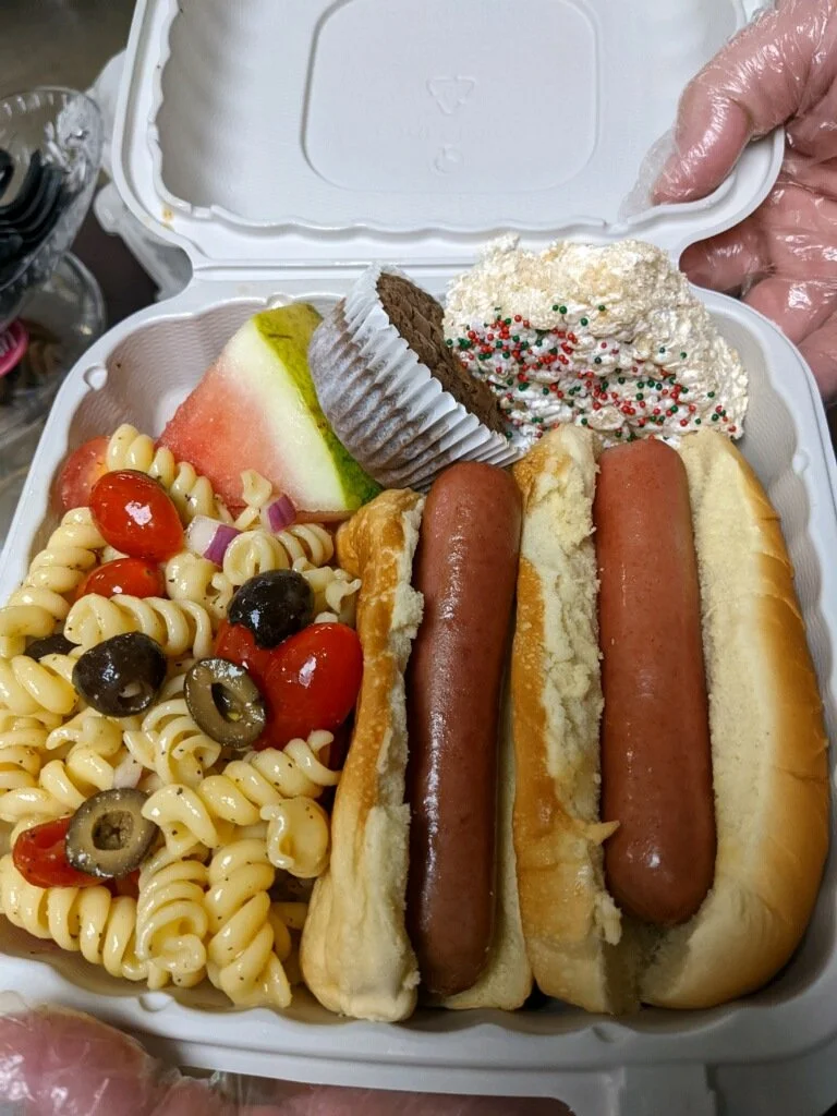 Serving a hot meal to our neighbors with Engage North Smithfield and The Milagros Project!