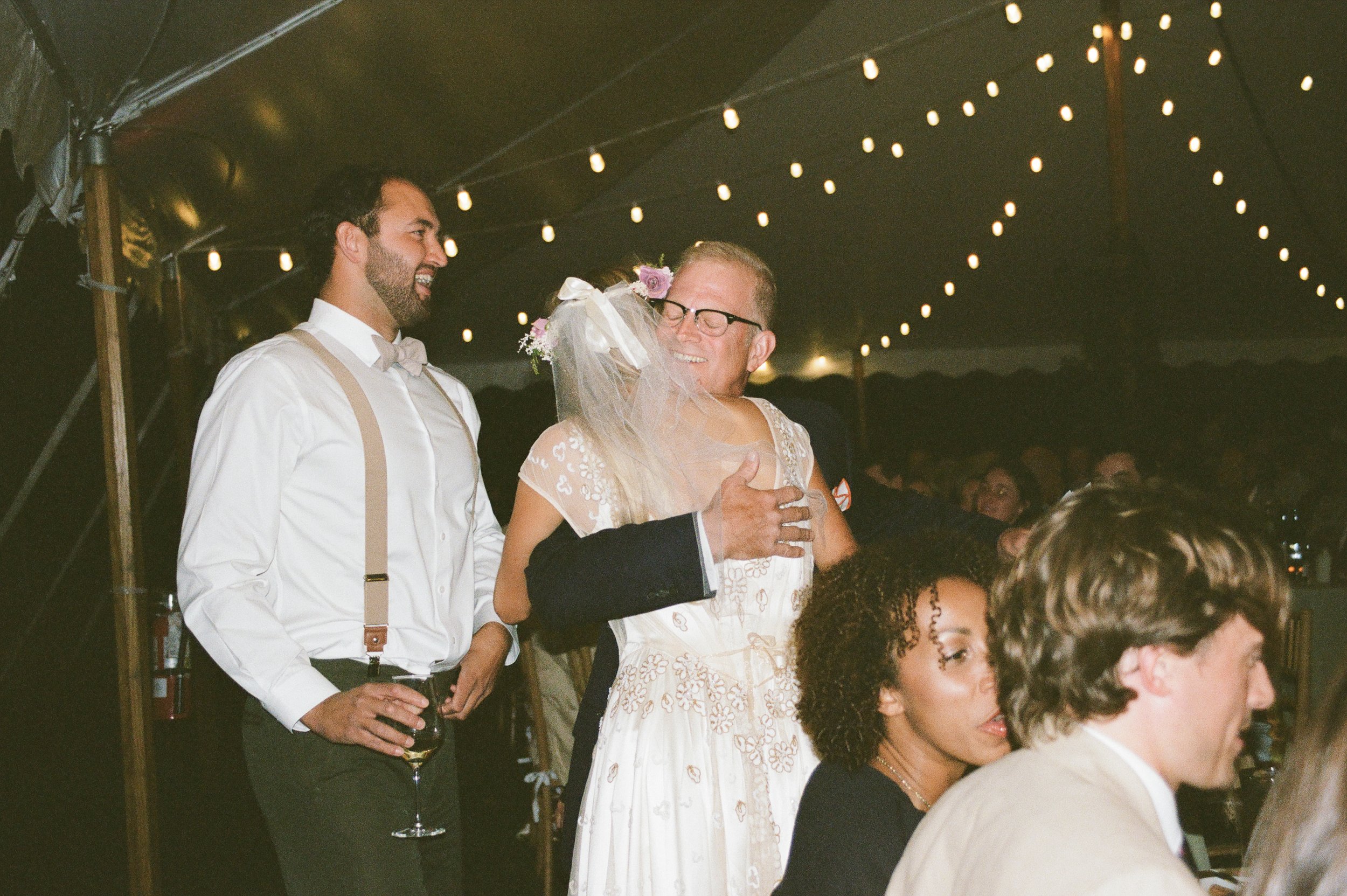 A Rhode Island wedding documented on 35mm film, capturing the unposed moments, quiet gestures, and joyful celebrations as they naturally unfold. Documentary-inspired wedding photography rooted in authenticity, nostalgia, and the beauty of real human 