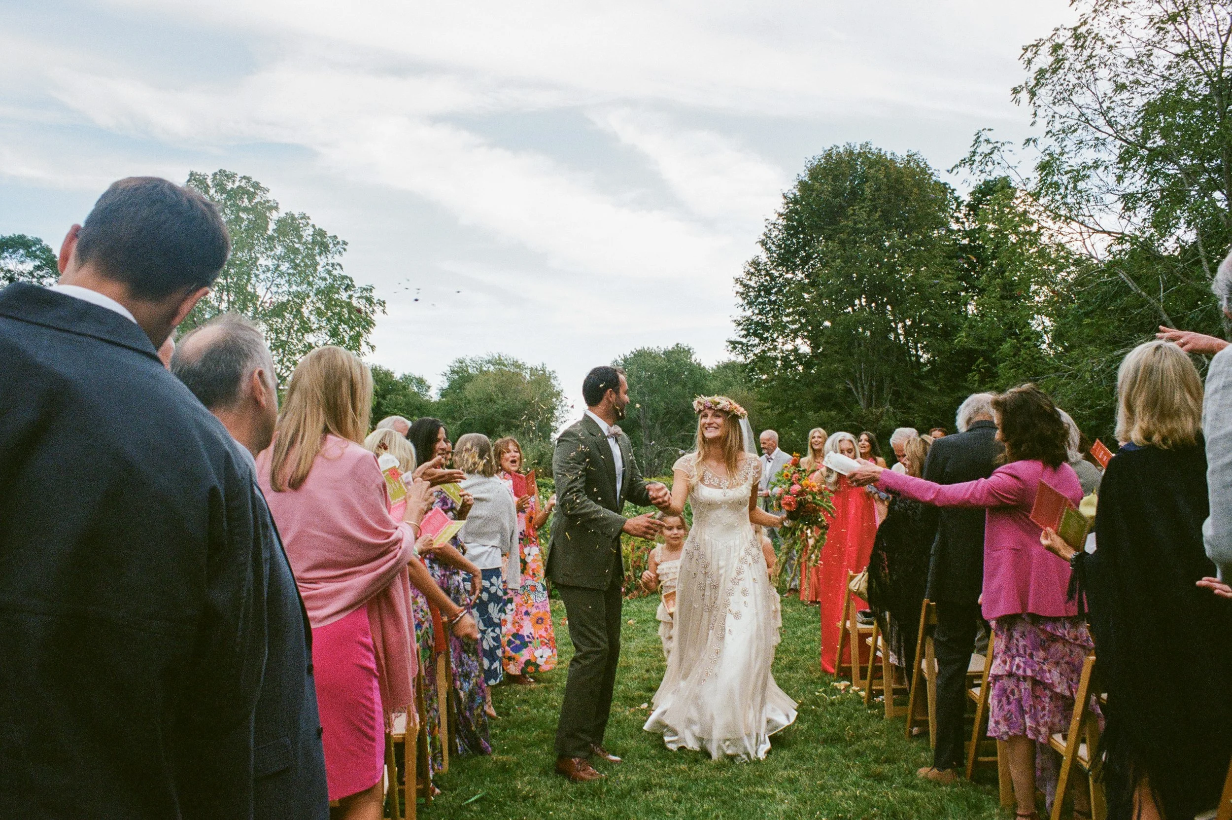 Explore fine-art wedding photography in Rhode Island, captured on 35mm film. From intimate celebrations to elegant New England weddings, each photograph preserves genuine emotion, romantic details, and the timeless beauty of the Rhode Island coastlin