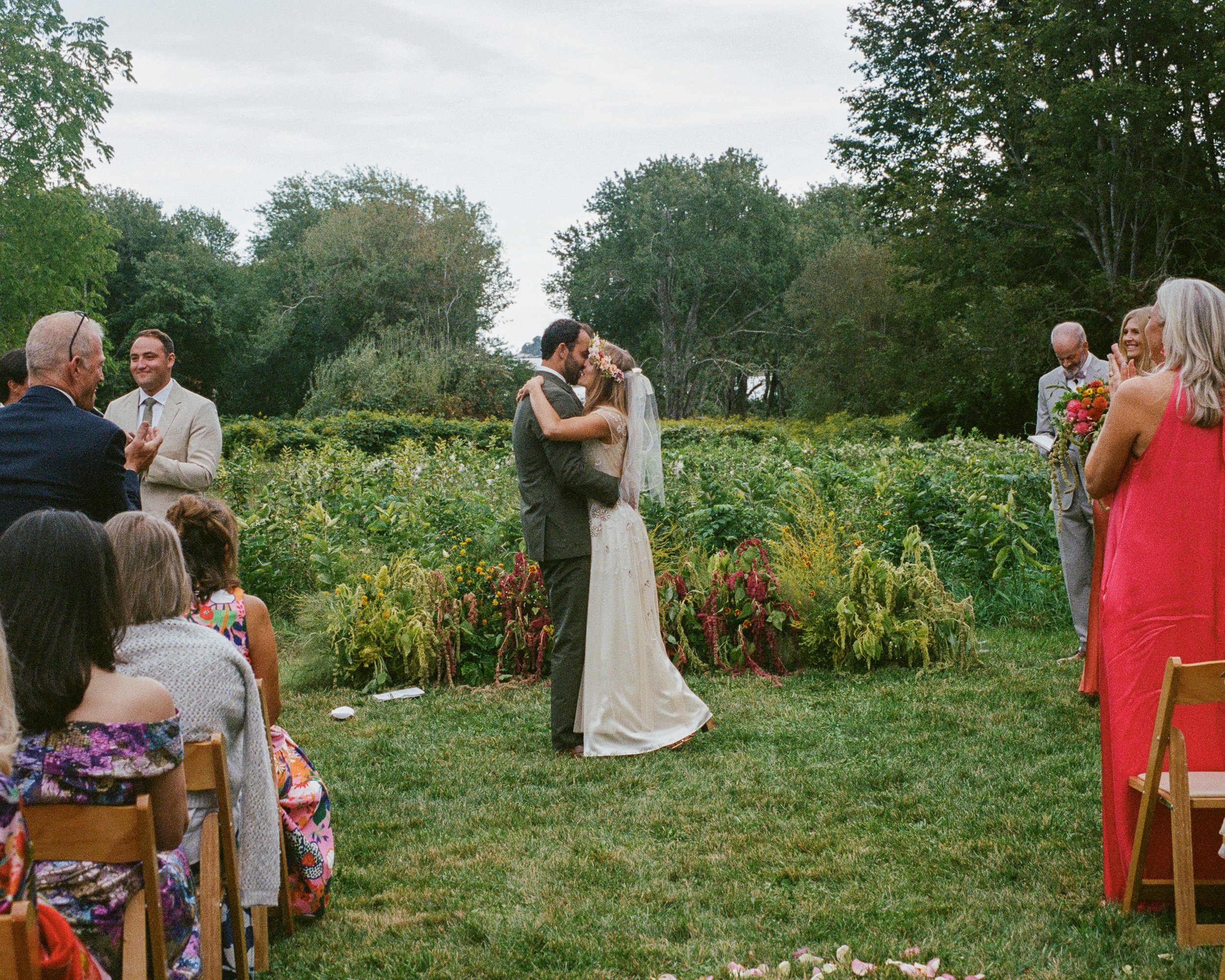 Explore fine-art wedding photography in Rhode Island, captured on 35mm film. From intimate celebrations to elegant New England weddings, each photograph preserves genuine emotion, romantic details, and the timeless beauty of the Rhode Island coastlin