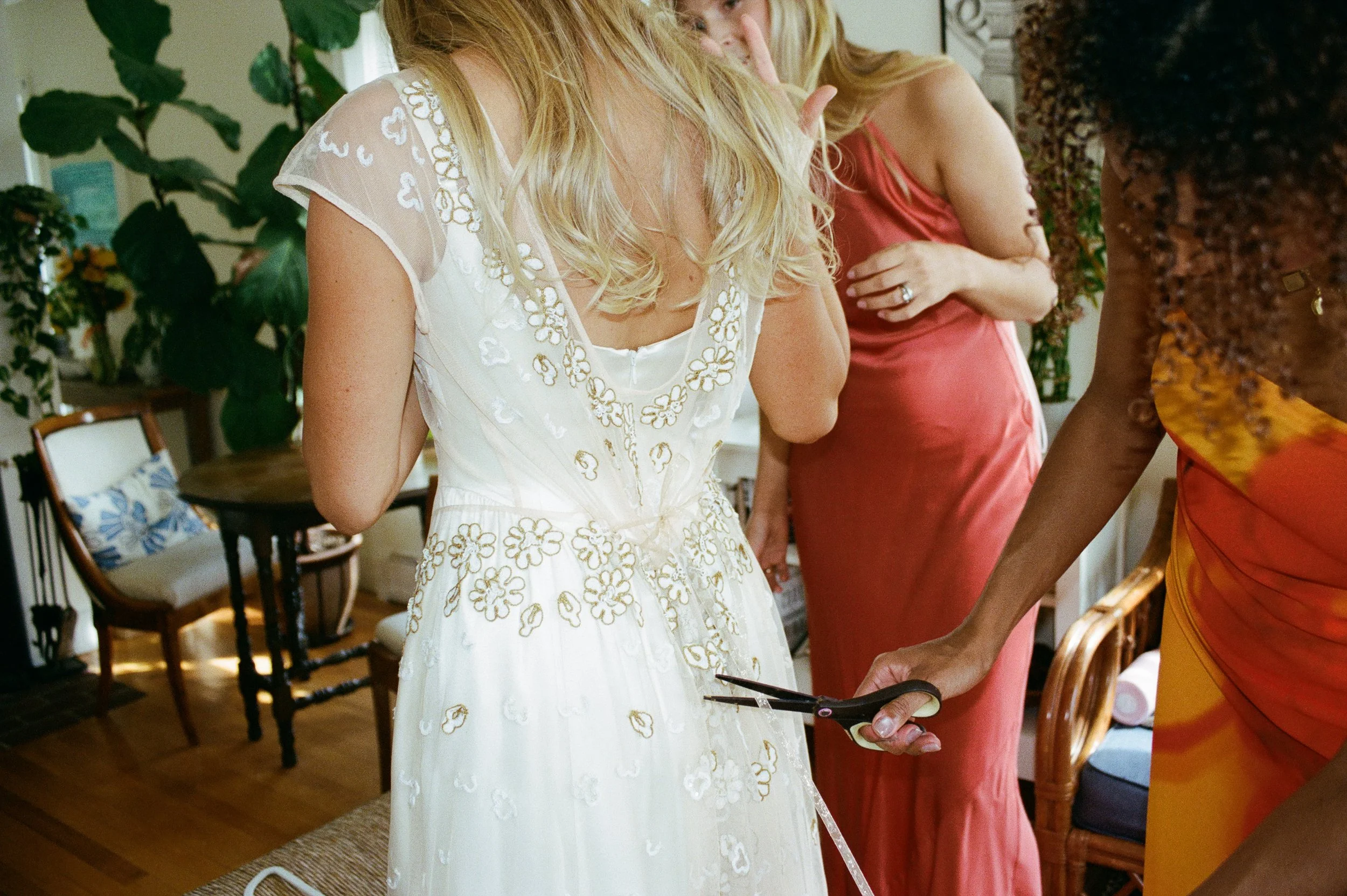 Romantic wedding getting-ready photography in Rhode Island, captured on a thoughtful blend of 35mm film and digital. Documenting the intimate moments before the ceremony, from bridal portraits and finishing touches to candid moments with loved ones. 