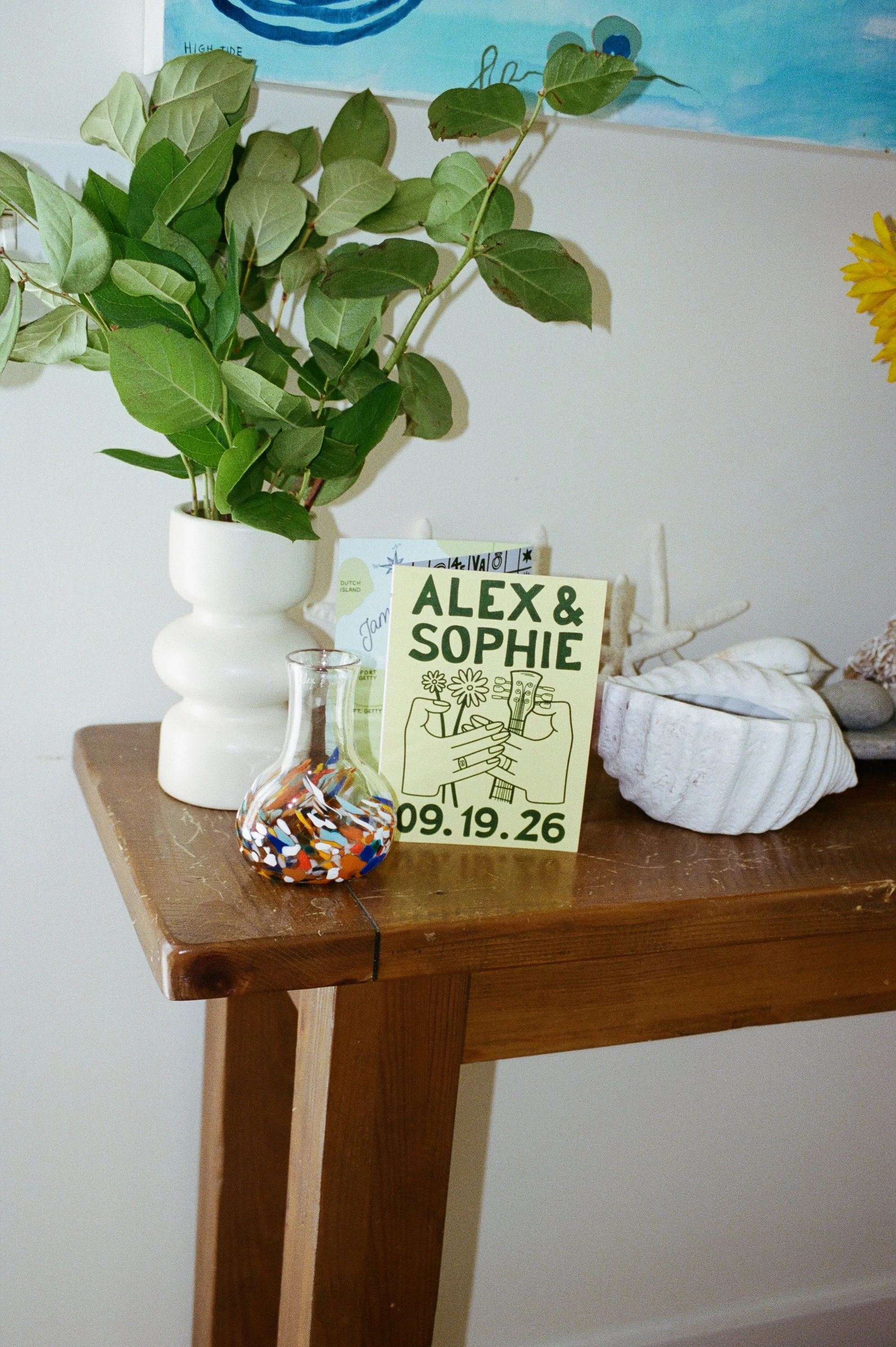 A romantic wedding floral still life featuring thoughtfully arranged blooms, delicate textures, and timeless botanical details. Fine-art wedding photography captured on film, highlighting the natural beauty, artistry, and thoughtful design of the wed