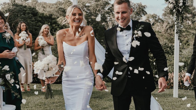 Wedding ceremony exit with petal confetti toss at Spicers Clovelly Estate