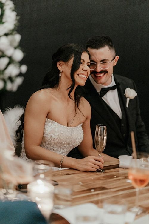 Stunning couple smiling at their wedding reception at The Refinery in Brisbane City