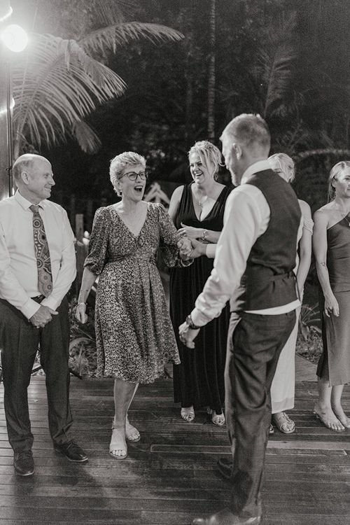 Mother and son share dance together at the dancefloor at a wedding reception