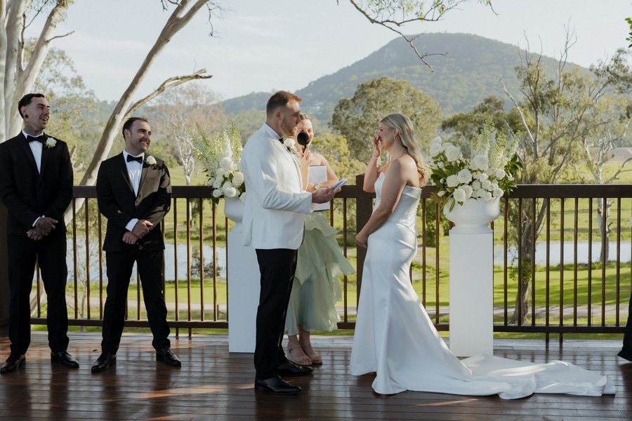 Emotional outdoor wedding ceremony at Yandina Station in Yandina Queensland