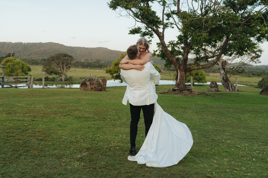 Laura and Brenton's romantic wedding portraits at Yandina Station on the Sunshine Coast