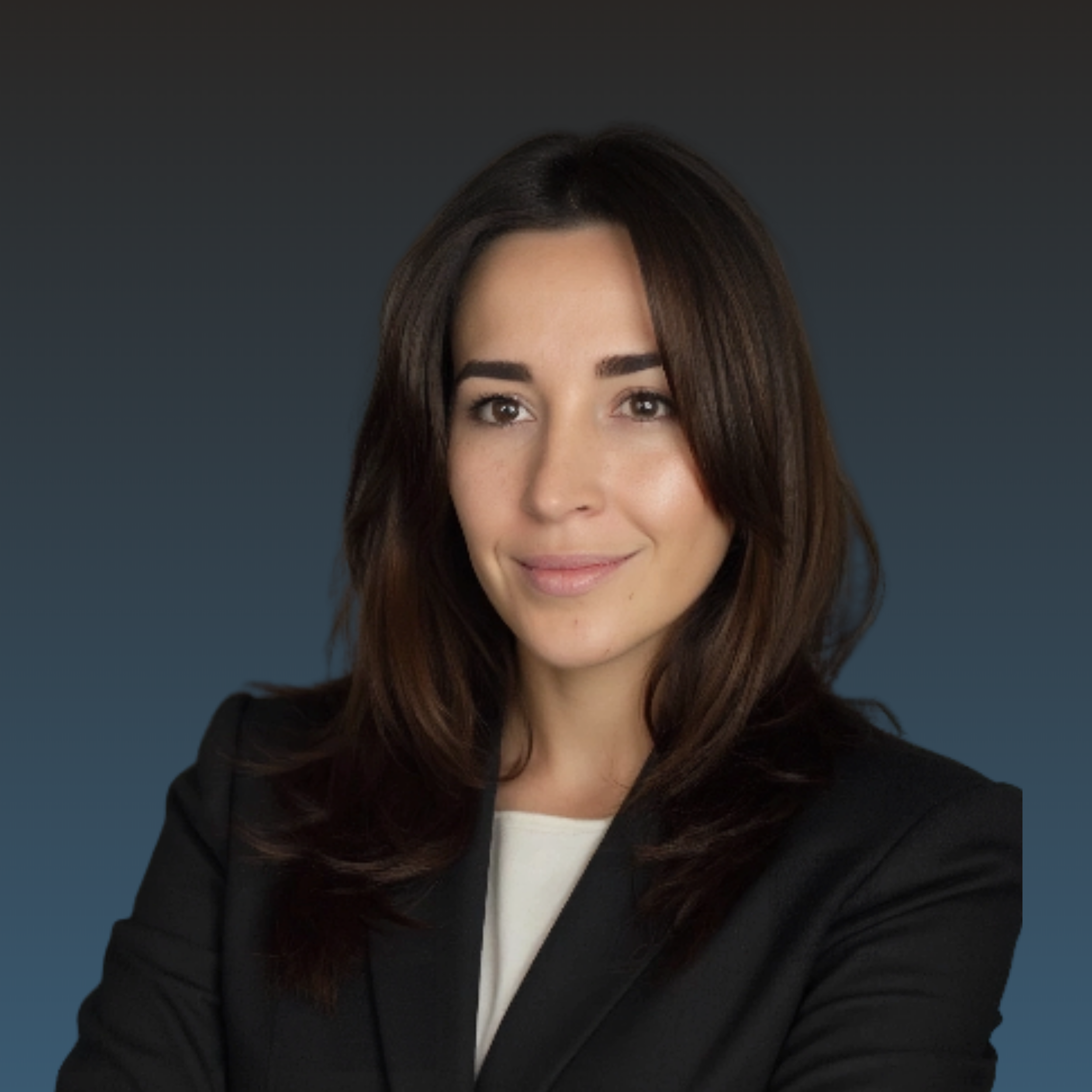 Professional woman with shoulder-length brown hair, wearing a black blazer, smiling with crossed arms against a dark blue gradient background.