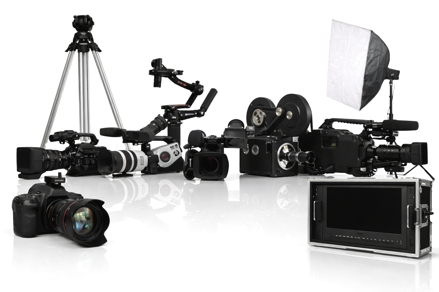 Collection of professional video and photography equipment including cameras, lenses, tripod, lighting, and monitoring monitor.