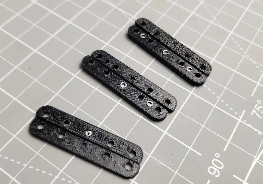 3013 - Revised battery spacer plates 1-2-3 dot package (2 each)