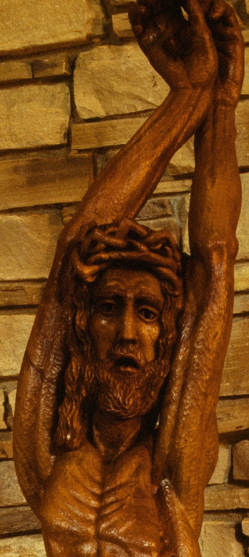A breathtaking 9-foot depiction of the Crucifixion by Robert Ortlieb, in English walnut.