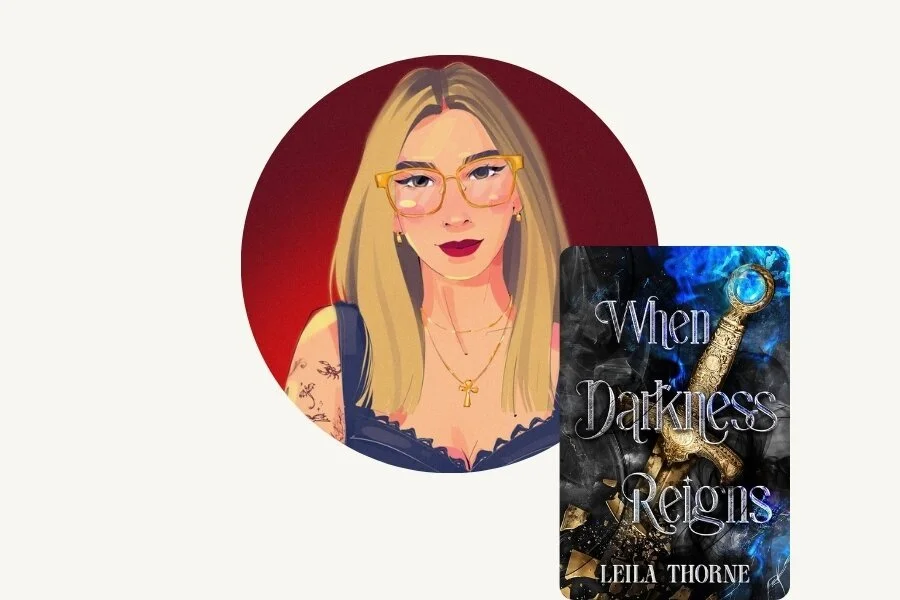 A woman with shoulder-length light brown hair, glasses, red lipstick, and a necklace, poses for a photo against a background of a window and wooden paneling. A book titled "When Darkness Reigns" by Leila Thorne is partially visible in front of her.