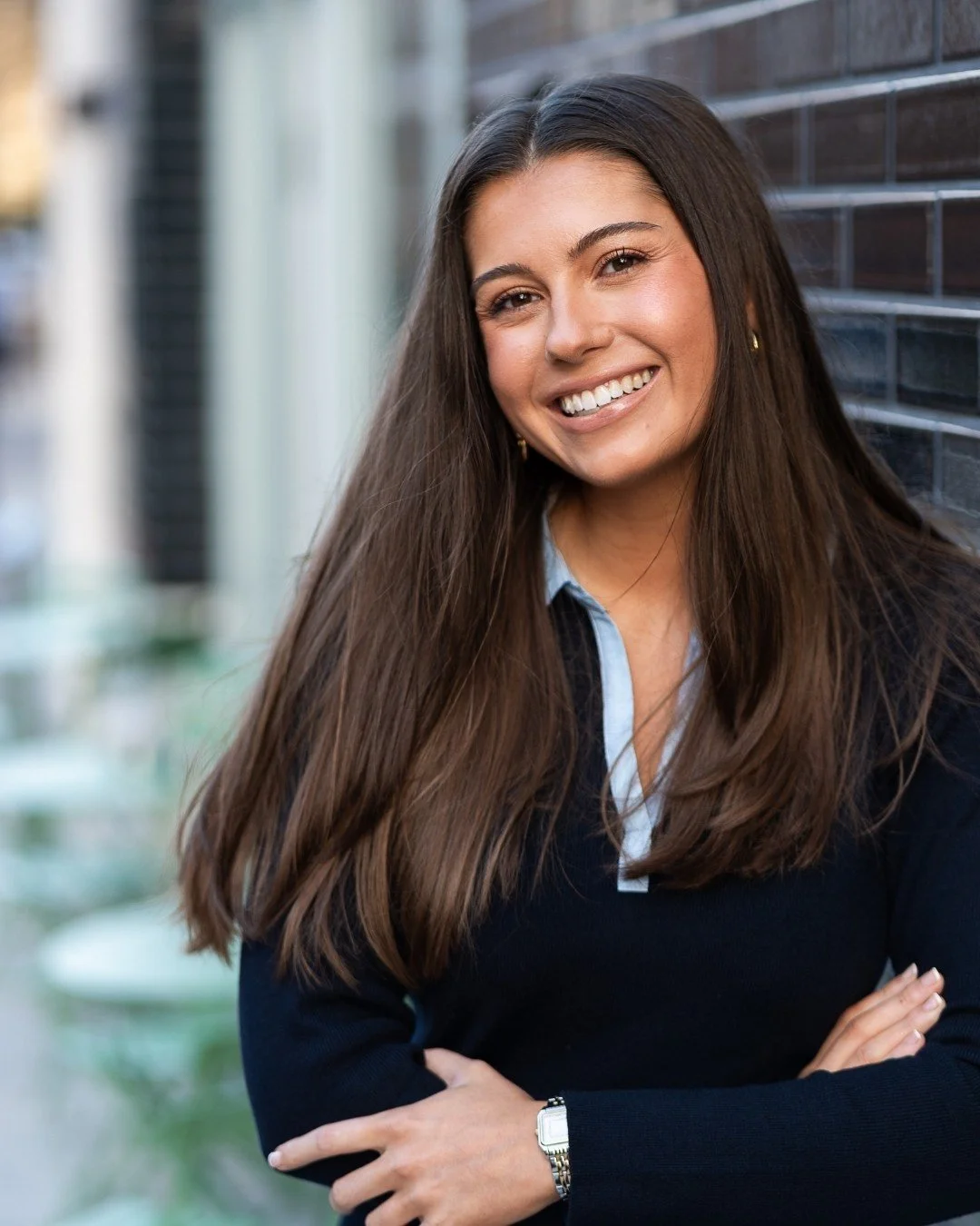 Headshot of Bonnie, a freelance book editor, outside a book shop