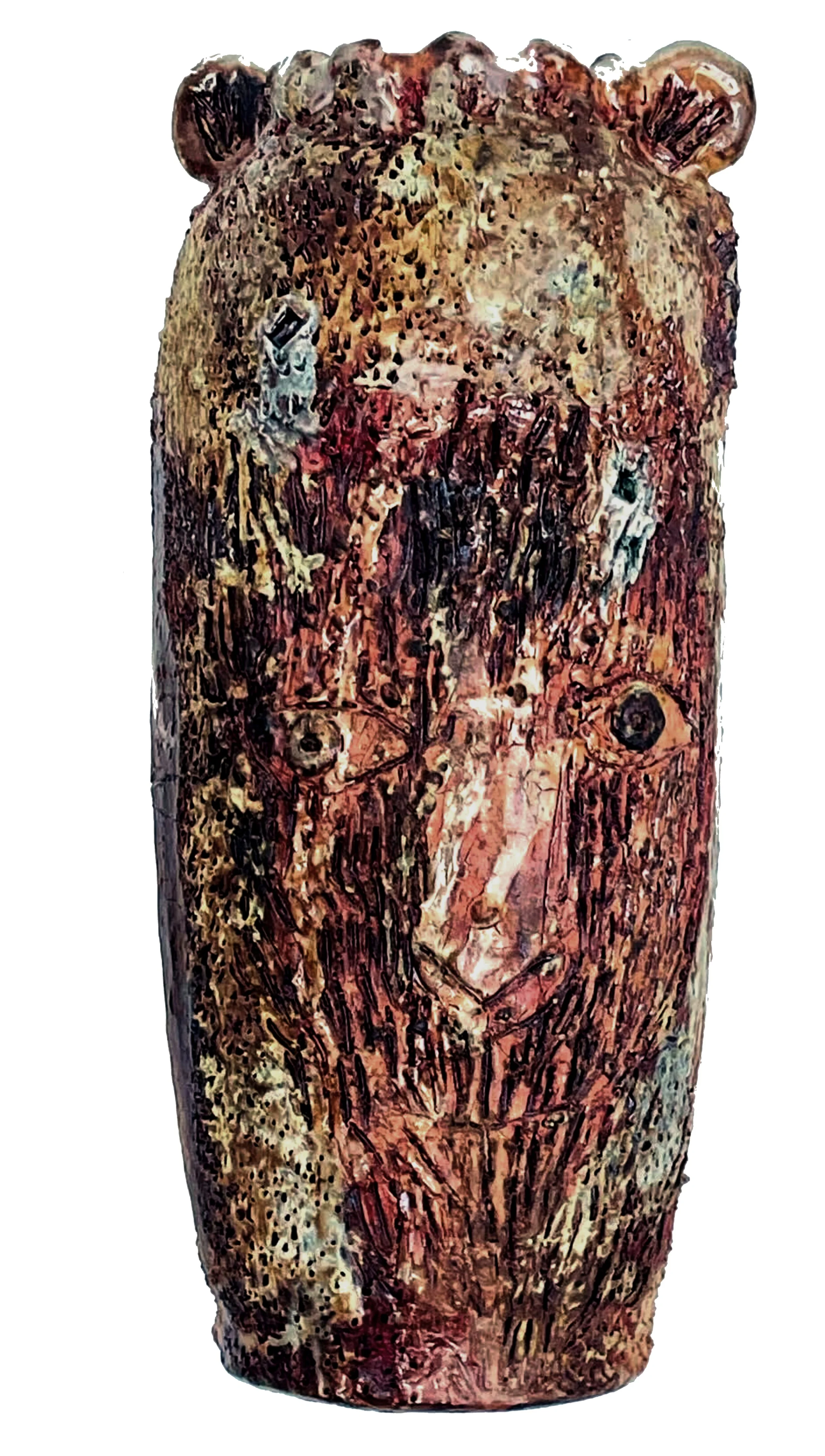 A painted wooden sculpture of a bear's head with detailed features.