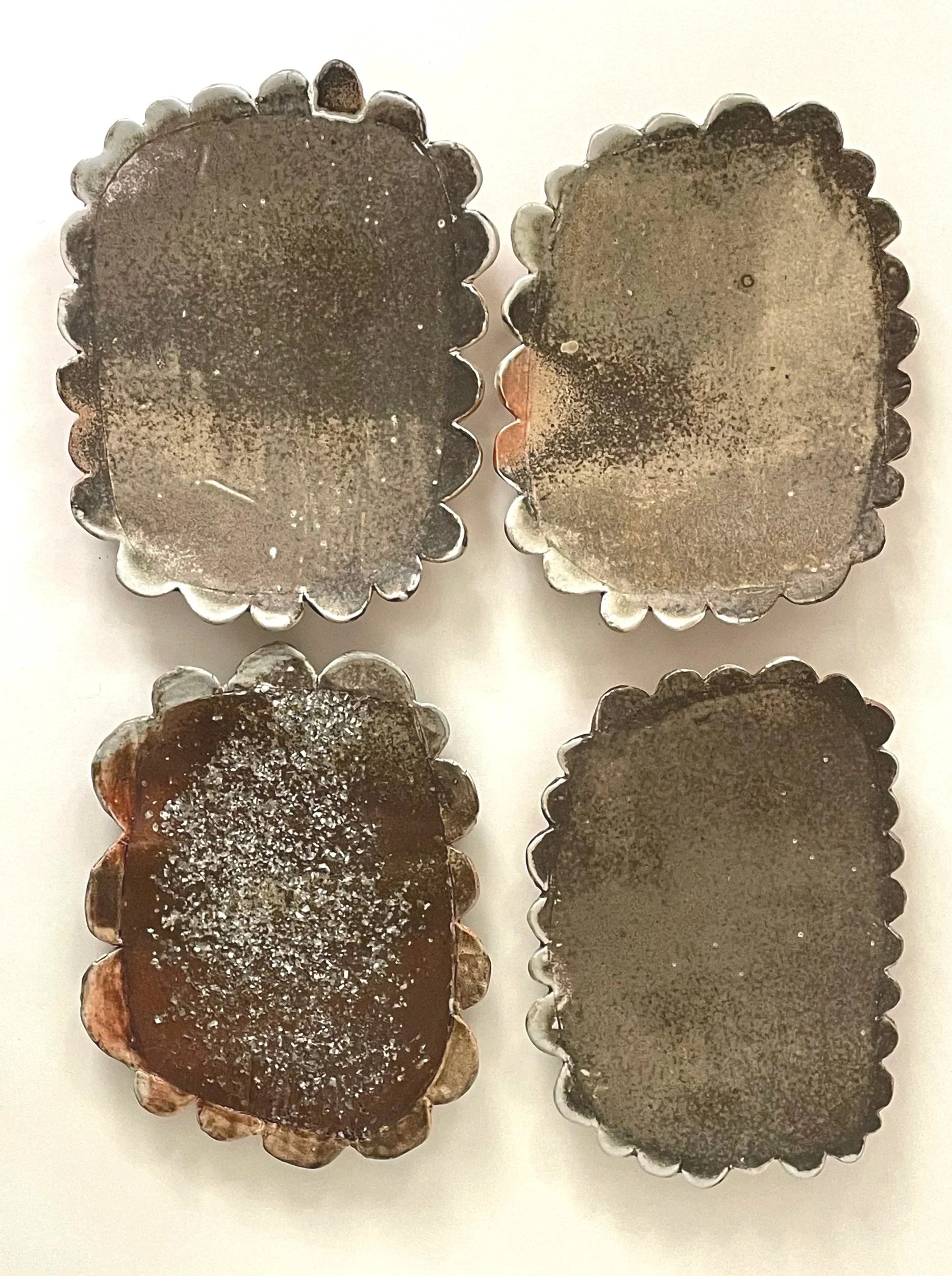 I see these works as receptive surfaces, rather than forms.  My interest is in how material records exposure, through ash accumulation, abrasion, heat, and interruption without attempting to describe or represent the forces involved. 

Rather than co