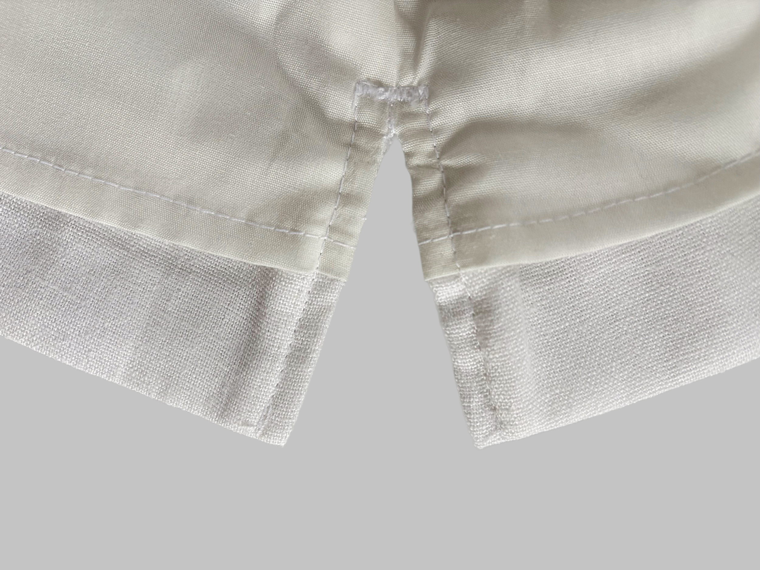 Close-up linen top mended side slit