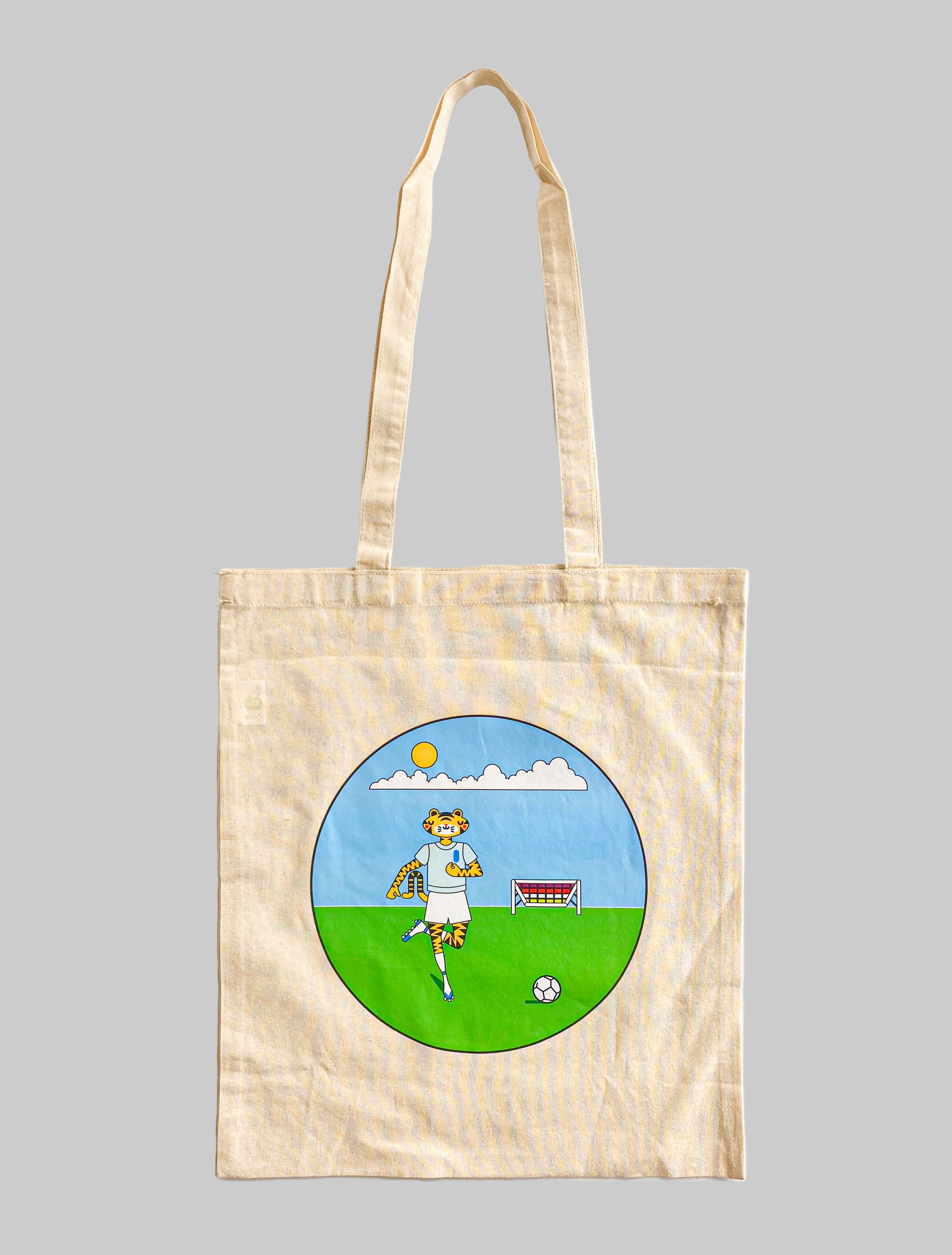 Digital image of a tiger playing football. Printed logo drawstring bag.