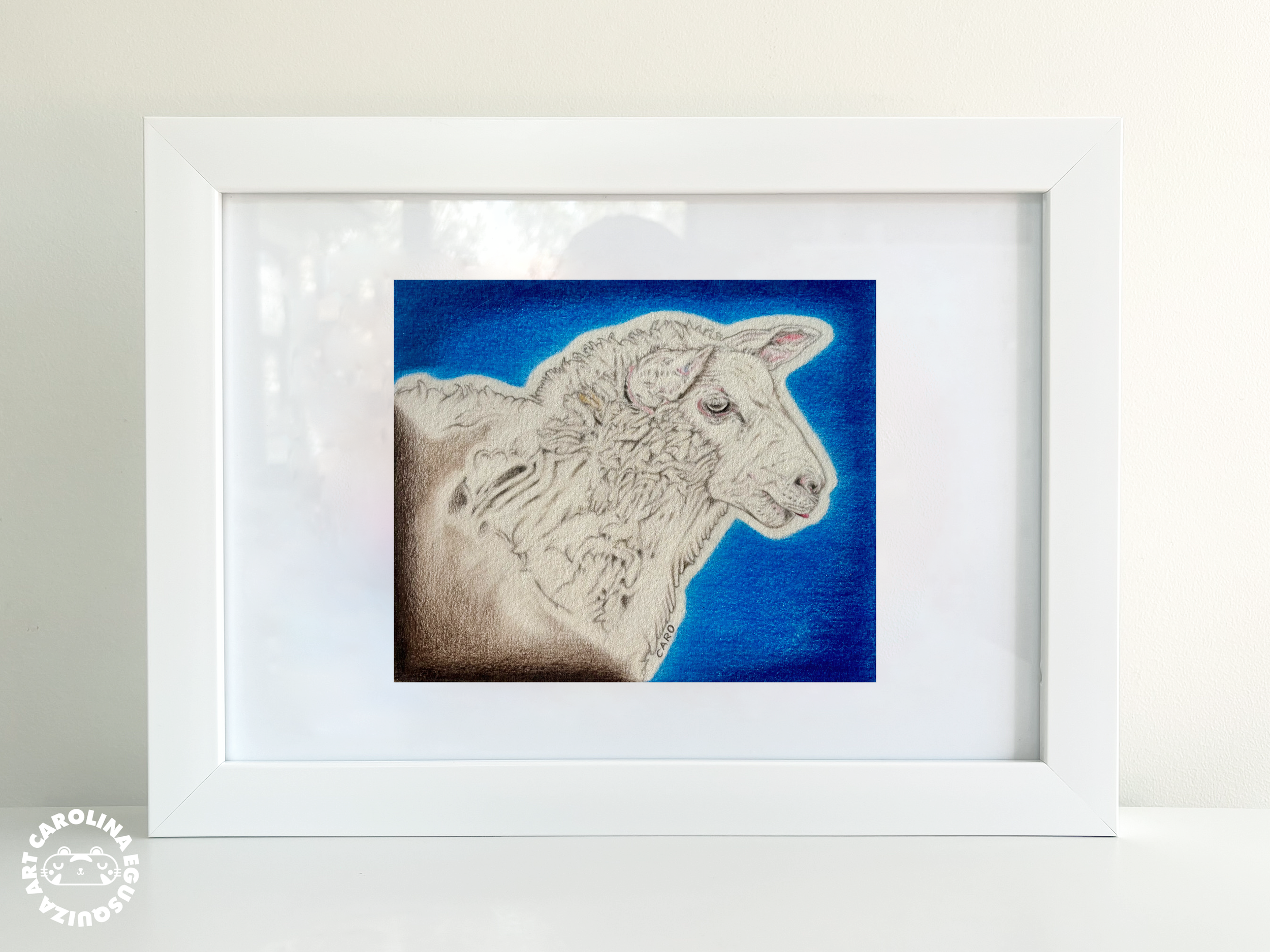 Framed art display of a sheep in full colour.