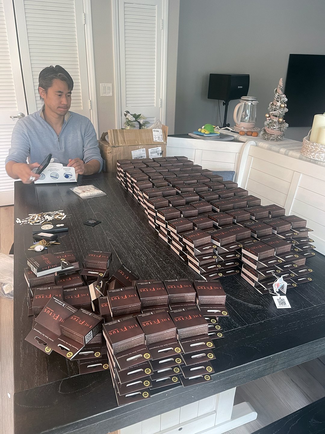 Behind-the-scenes photo showing branded condoms created as promotional merchandise for the indie horror film The Fetus.