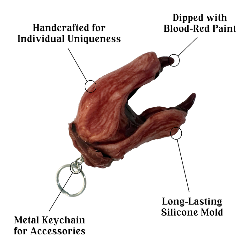 the-fetus-head-keychain-features-hand-painted-silicone.png